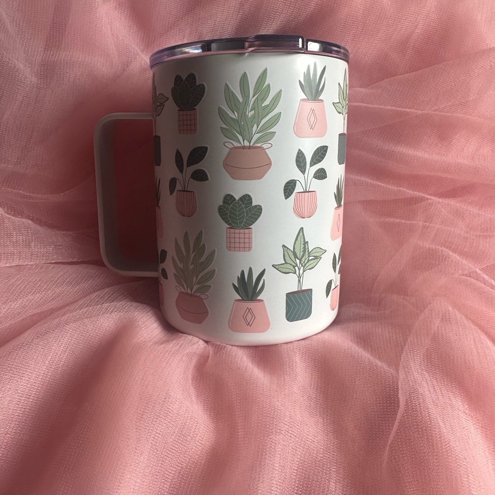 Stainless steel 14 ounce travel mug. White, pink and green with Plant Pot Design